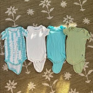 Four 18-24mo Kyte Baby Onesies